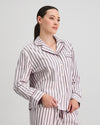Model wears Cosy Flannel Long Sleeve Pj Top in PINK-A-BOO. On body side view