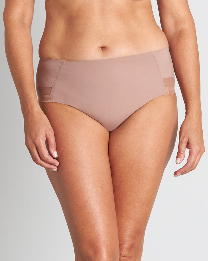 Model wears Comfit Collection Midi in MOCHA. On body front view