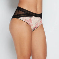 Model wears Yasmin Midi in BAKED APPLE PRINT. On body side view