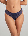 Model wears Sofia Thong in Medieval Blue. On body front view