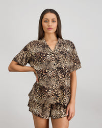 Model wears Dare To Dream Short Pj Set in WILD LYNX PRINT. On body front view