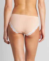 Model wears Nikki Bikini in SPANISH VILLA/WHITE. On body back view