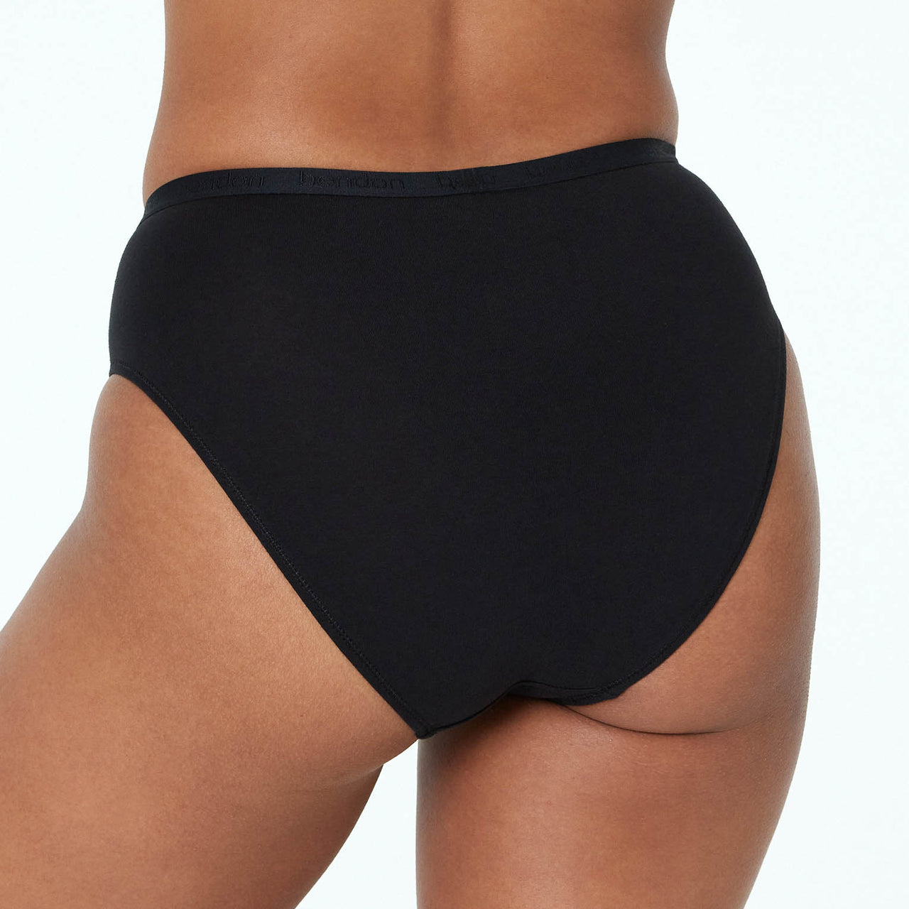 Model wears Body Cotton High Cut Brief in BLACK. On body back view
