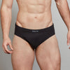 Model wears Cotton Stretch Mens Brief in BLACK. On body front view