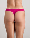 Model wears Extra-Ordinary Thong in FANTASY FUCHSIA. On body back view