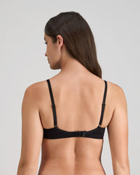 Model wears Extra-Ordinary Contour Bra in BLACK. On body back view
