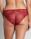 Model wears Fae Brazilian in BIKING RED. On body back view