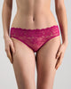 Model wears Lacey Bikini in FANTASY FUCHSIA. On body front view