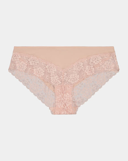 Model wears Lace Trim Brazilian in LATTE. On body front view