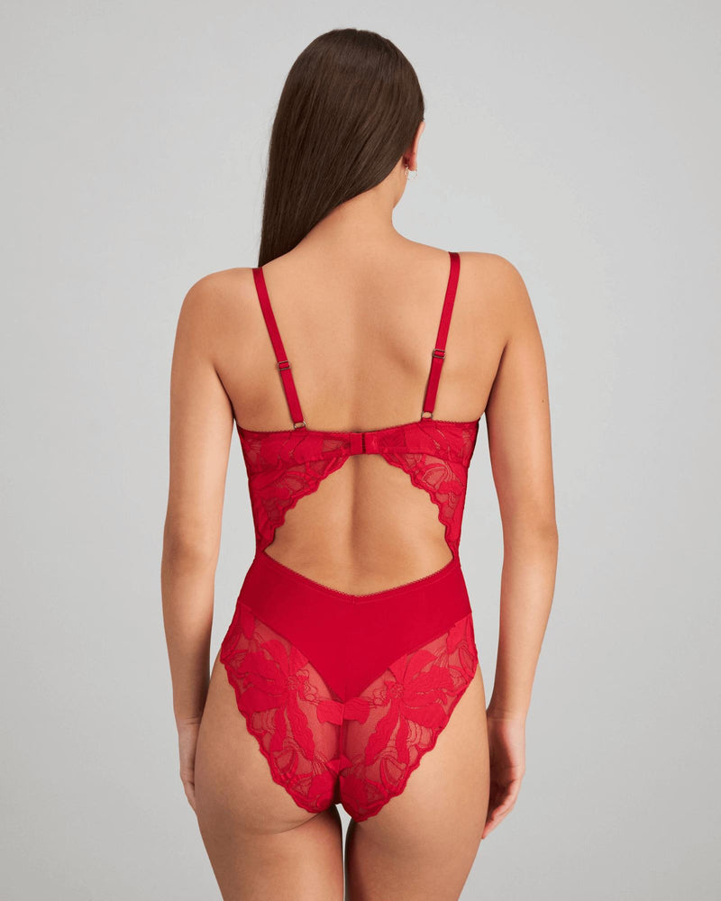 Model wears Margot Estelle Bodysuit in JESTER RED. On body back view