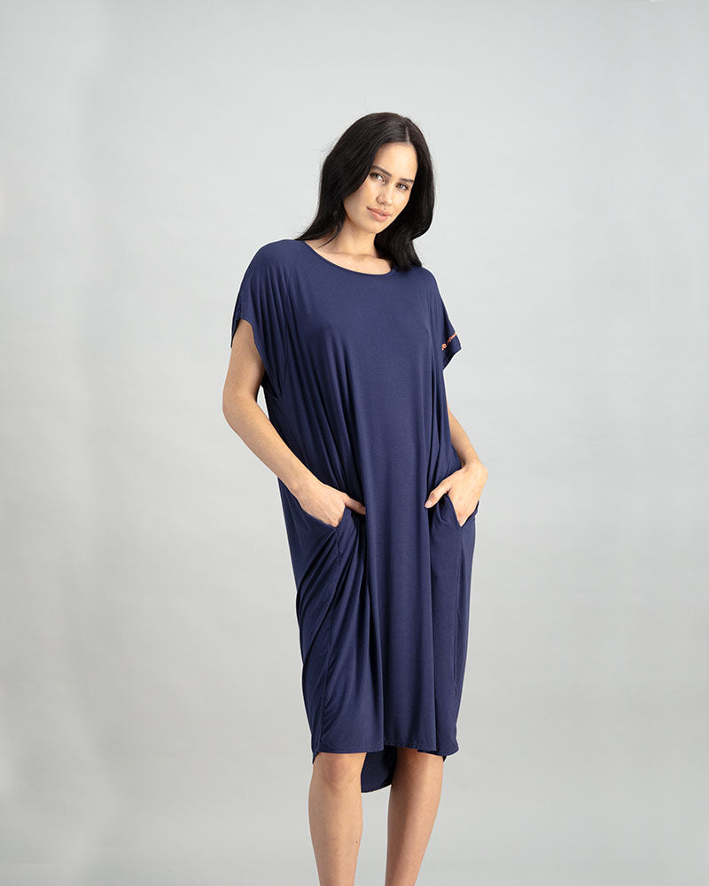 Model wears Belle Bamboo Nightie in EVENING BLUE. On body front view
