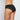 Model wears Lace Trim Brazilian in BLACK. On body back view