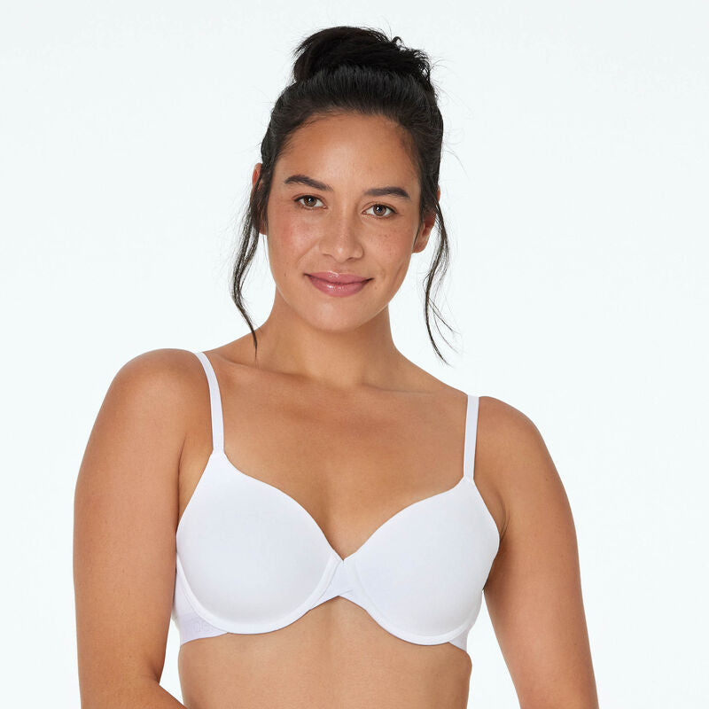 Model wears Body Cotton Contour Bra in WHITE. On body front view
