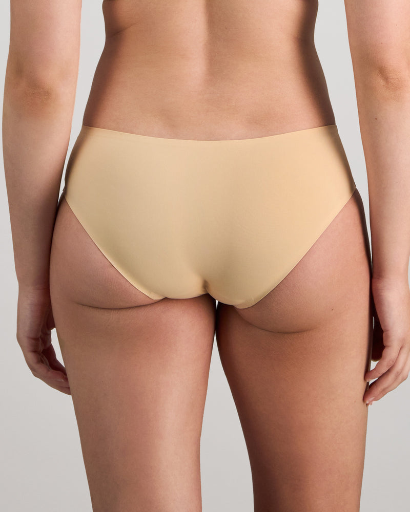 Model wears My Fit Smooth Brazilian in FRAPPE. On body back view