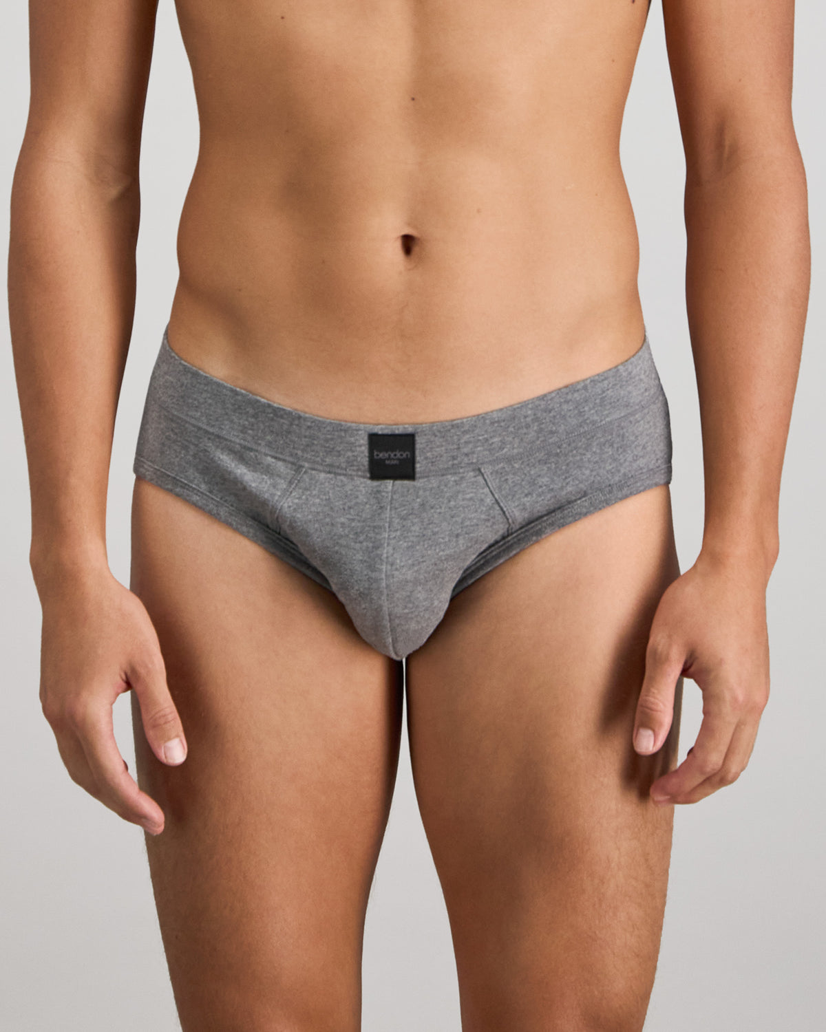 Model wears High Tech Cotton Mens Brief in GREY MARL. On body front view