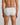 Model wears Bamboo Mens Brief in GREY MARLE. On body back view