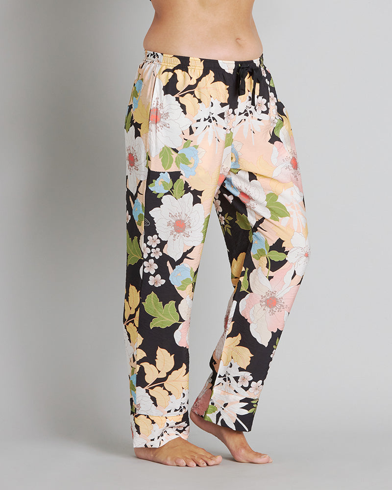 Model wears Mihika Sleeping Long PJ Pant in MID-SUMMER PRINT. On body side view