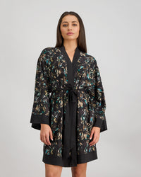 Model wears Lost Paradise Robe in BLACK PRINT. On body front view