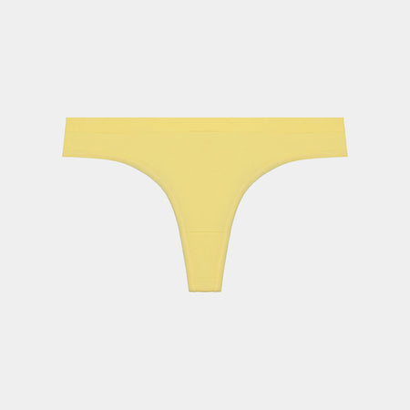 Seamless Thong in SUNSHINE YELLOW. Flat lay front view