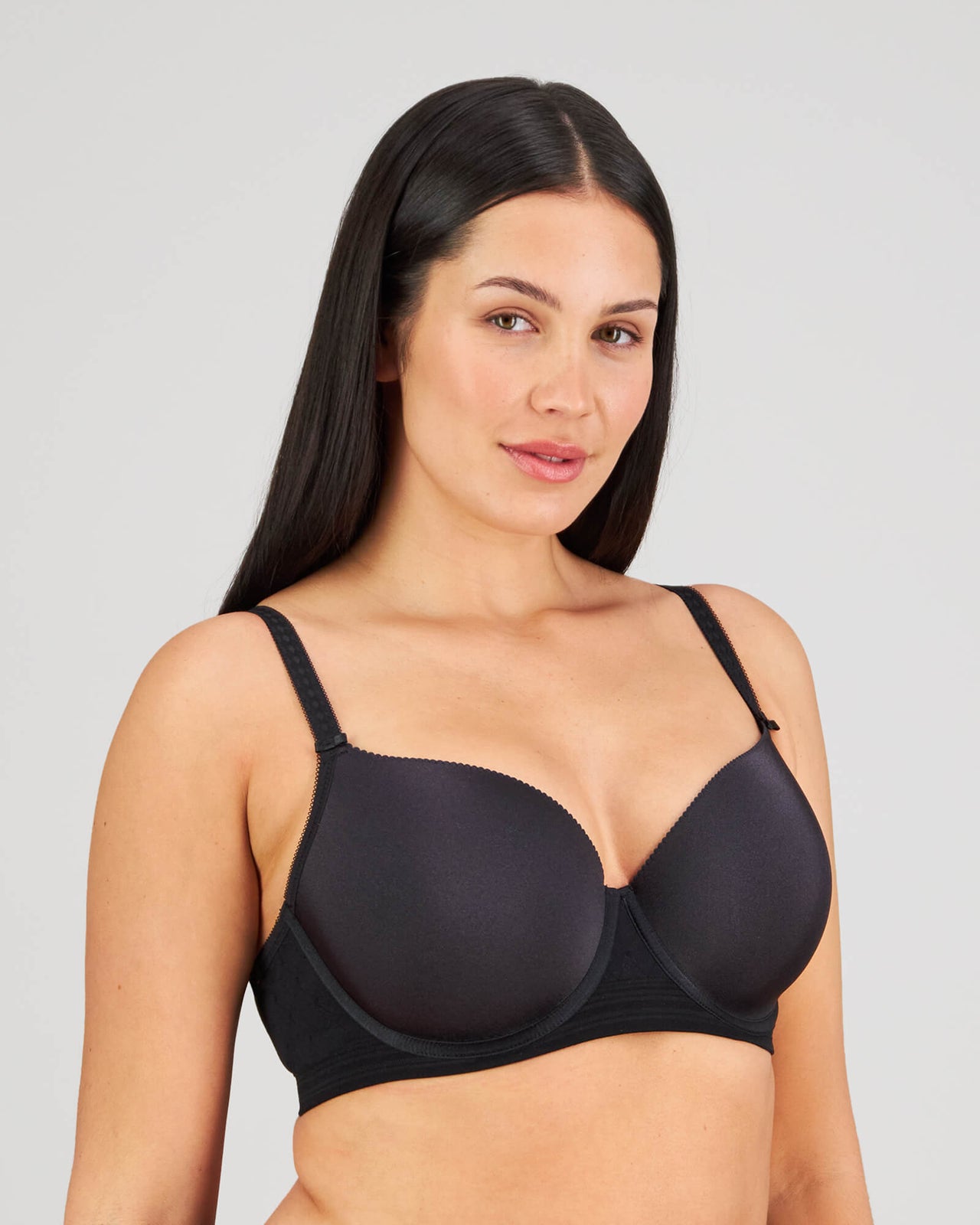 Model wears Bendon Body Contour Bra in BLACK. On body side view