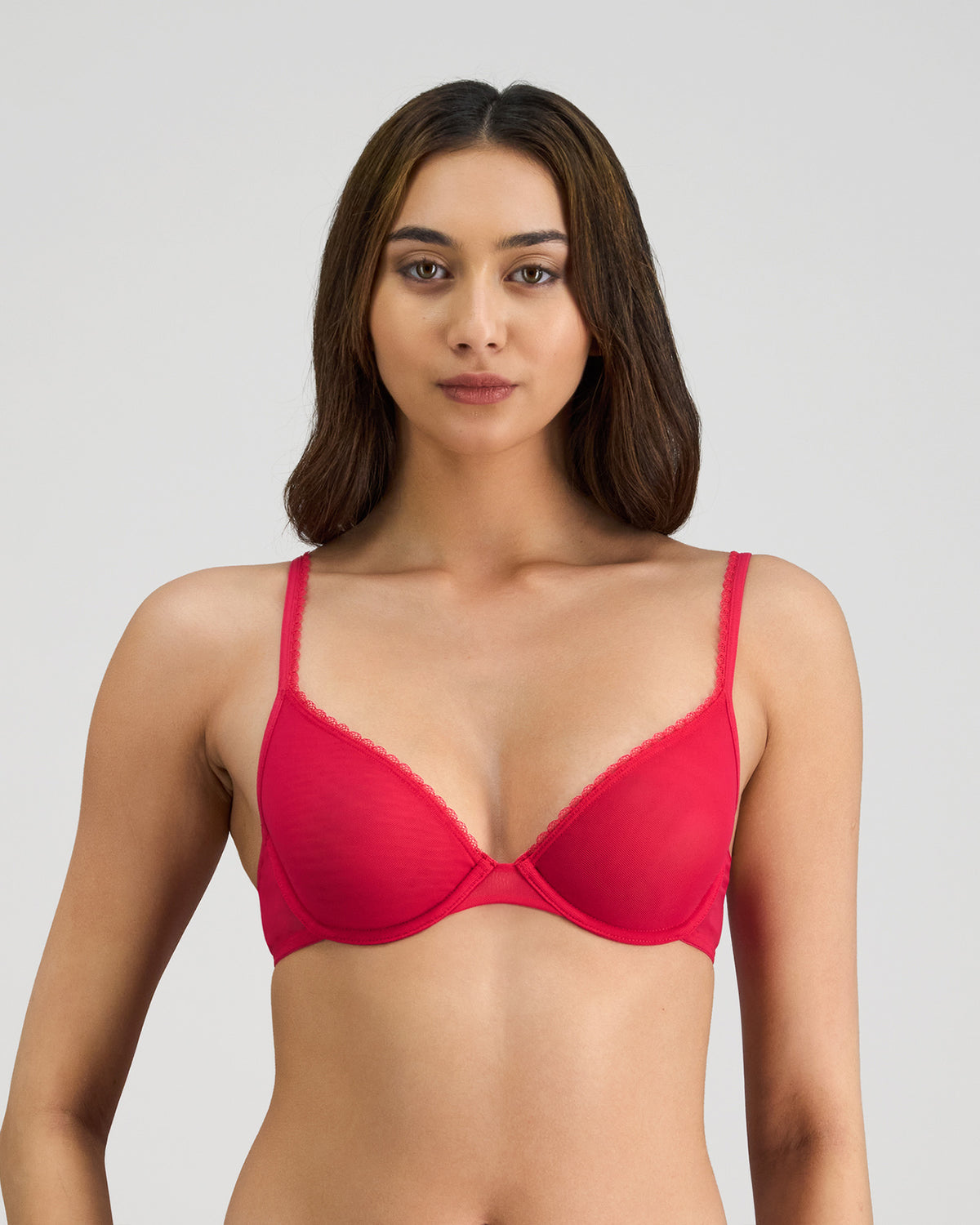 Model wears Skinlite Underwire Bra in JAZZY. On body front view