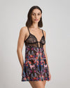 Model wears Adaline Chemise in BLACK FLORAL PRINT. On body side view