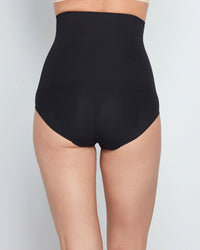 Model wears Bamboo Bodywear High Waisted Brief in BLACK. On body back view