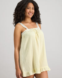 Model wears Bonbon Babydoll in TRANSPARENT YELLOW. On body side view