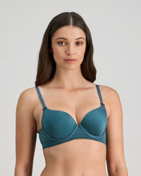 Model wears Bendon Body Contour Bra in MEDITERRANEA. On body side view