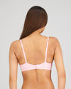 Model wears Yvette Underwire Bra in ICY PINK. On body back view