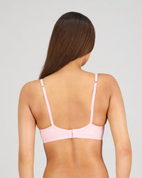 Model wears Yvette Underwire Bra in ICY PINK. On body back view