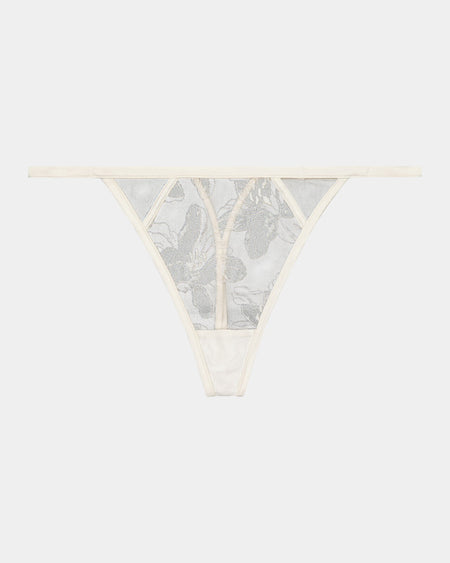 Olivia Luxe Thong in CHAMPAGNE. Flat lay front view
