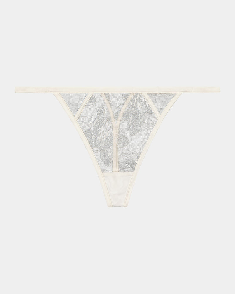 Olivia Luxe Thong in CHAMPAGNE. Flat lay front view