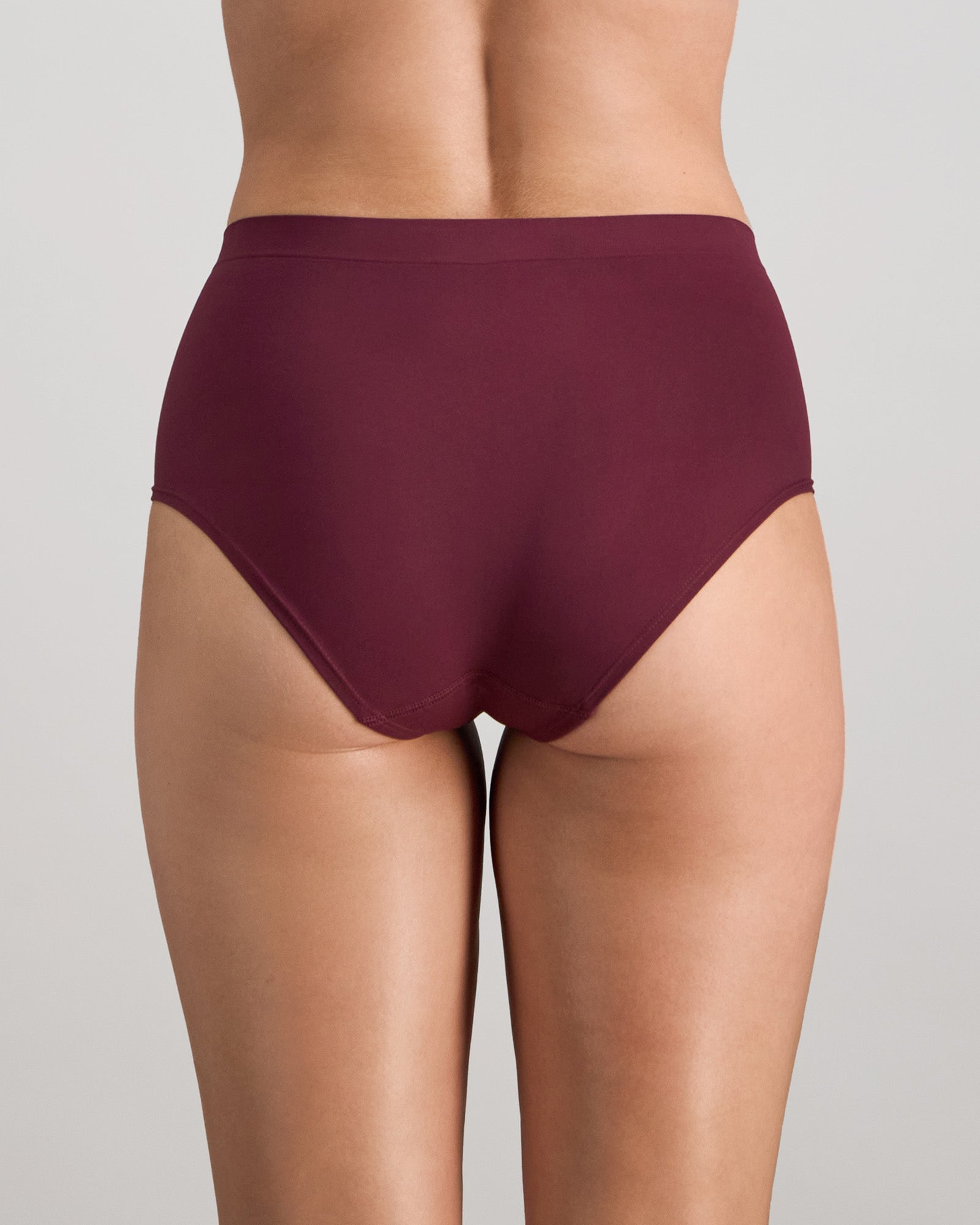 Model wears Seamless Soft Full Brief in FIG. On body back view