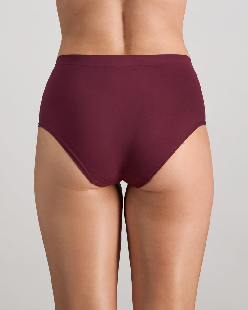Model wears Seamless Soft Full Brief in FIG. On body back view
