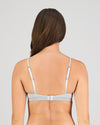 Model wears Simply Seamless Contour Bra in GREY MARL/WHITE STRIPE. On body back view