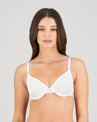 Model wears Angelica Contour Bra in WHITE. On body front view