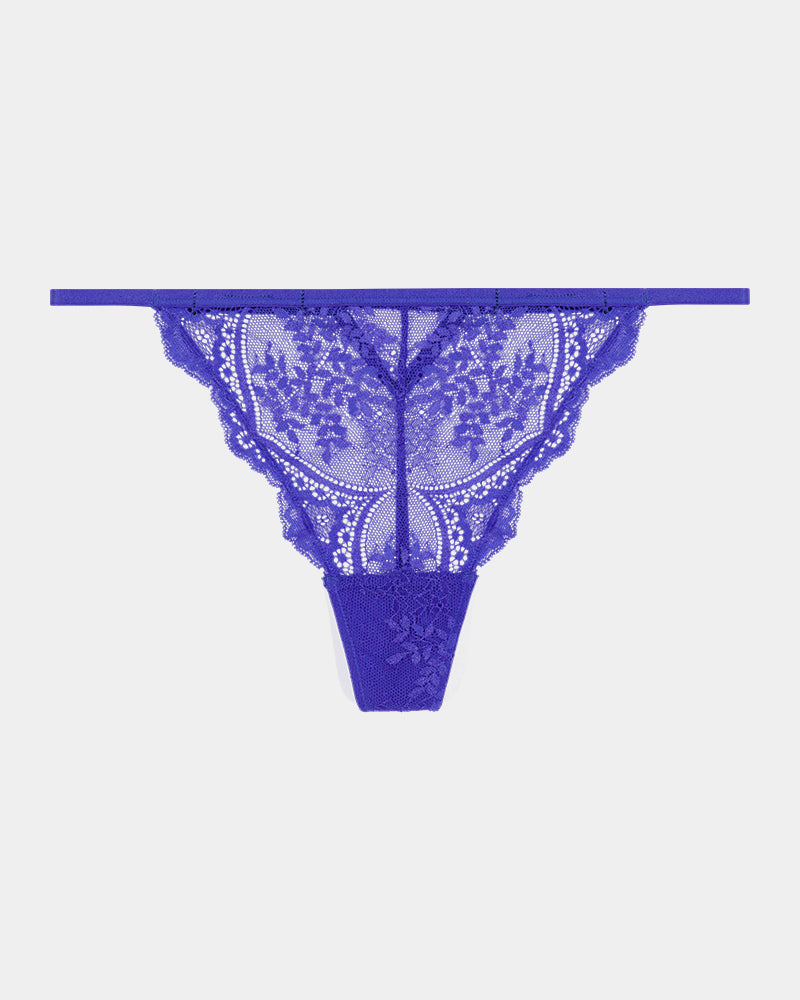 Midnight Muse Thong in DAZZLING BLUE. Flat lay front view