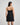 Model wears Understatement Slip in BLACK. On body back view
