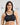 Model wears Stamina Wire Free Bra in BLACK. On body front view