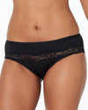 Model wears Simply Me Bikini in BLACK. On body front view