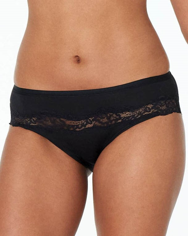 Model wears Simply Me Bikini in BLACK. On body front view