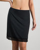 Model wears Understatement Slip in BLACK. On body front view