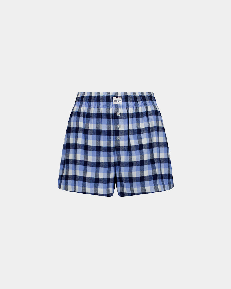 Cosy Flannel Short in BLUE CHECK. Flat lay front view