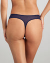 Model wears Sofia Thong in Medieval Blue. On body back view