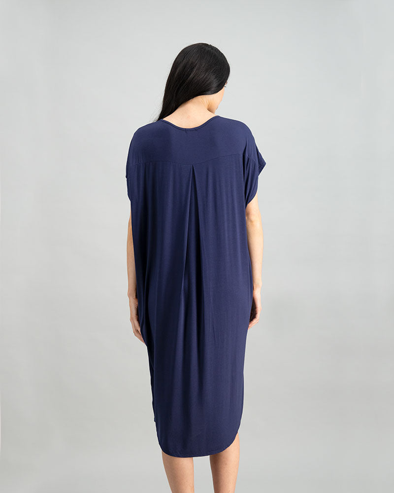 Model wears Belle Bamboo Nightie in EVENING BLUE. On body back view