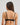 Model wears Oasis Glow Underwire Bra in BLACK. On body back view