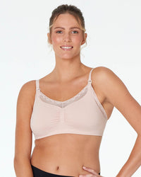 Model wears Bendon Nurture Maternity Bra in LATTE. On body front view