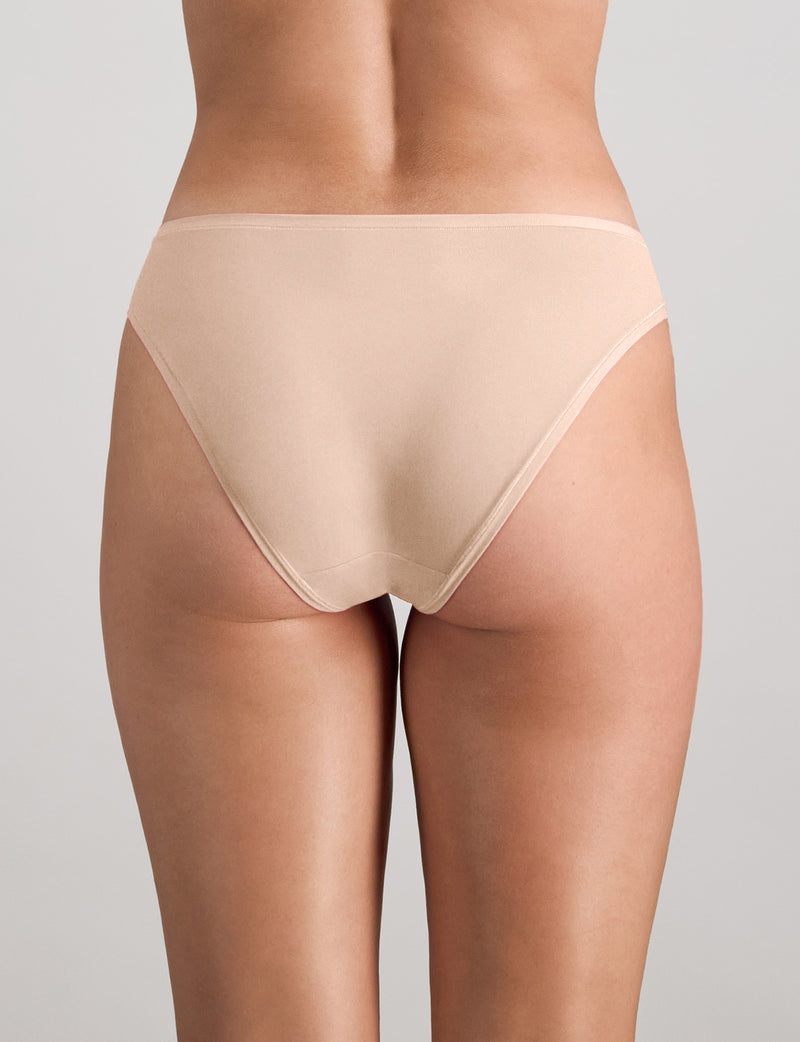 Model wears Extra-Ordinary Bikini in LATTE. On body back view