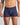 Model wears Cotton Stretch Mens Trunk in PEACOAT PINSTRIPE. On body front view